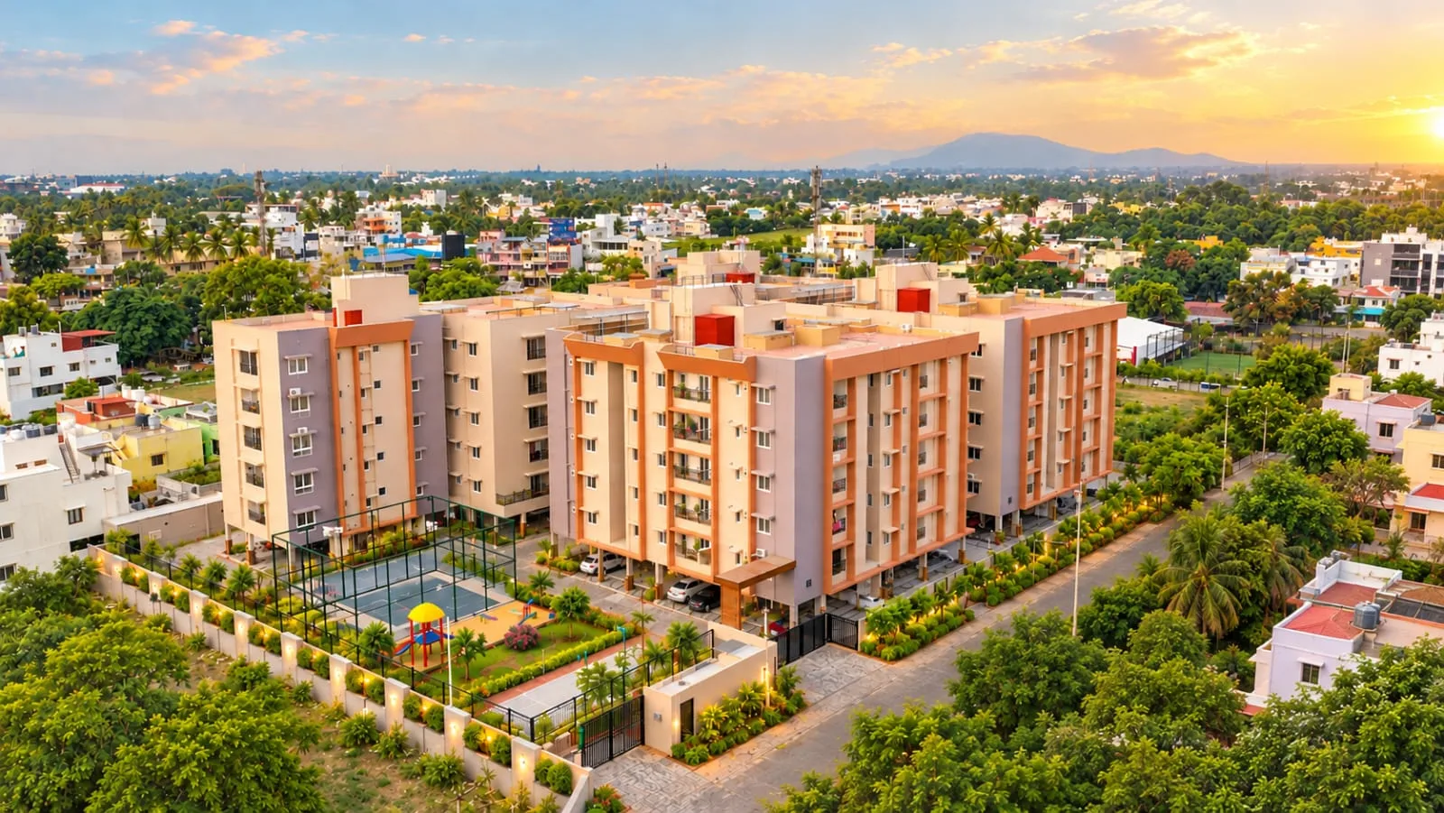 Aerial view of Utsav Hills at sunset with the hills of Coimbatore behind